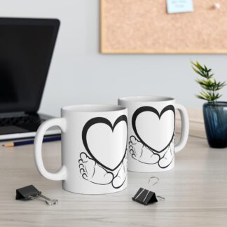 Black Footprints under a Heart |11oz Ceramic Mug.